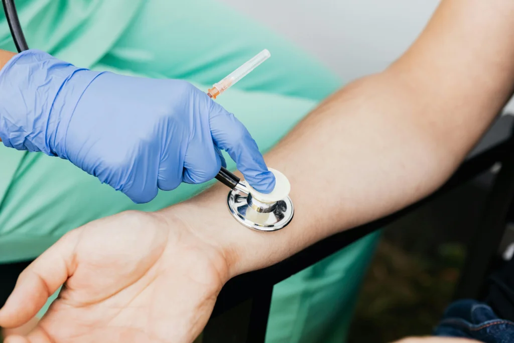 Healthcare professional examining a patient