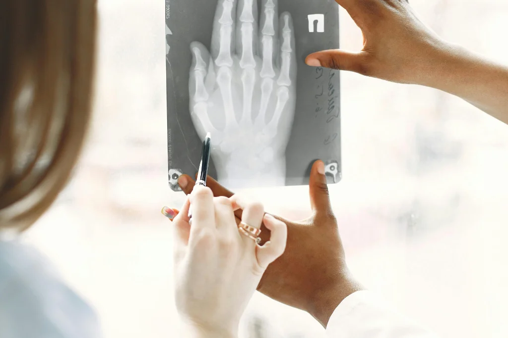 Practitioner reviewing patient documentation and treatment notes